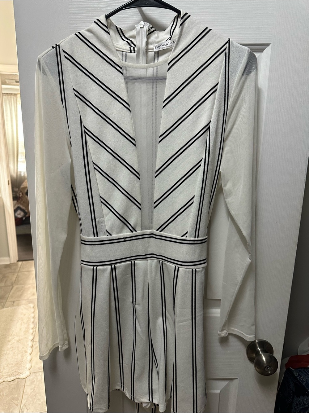 Nanamacs White Jumpsuit with Black Stripe Detail